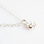 Tiny flower pendant