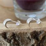 Silver hug earrings